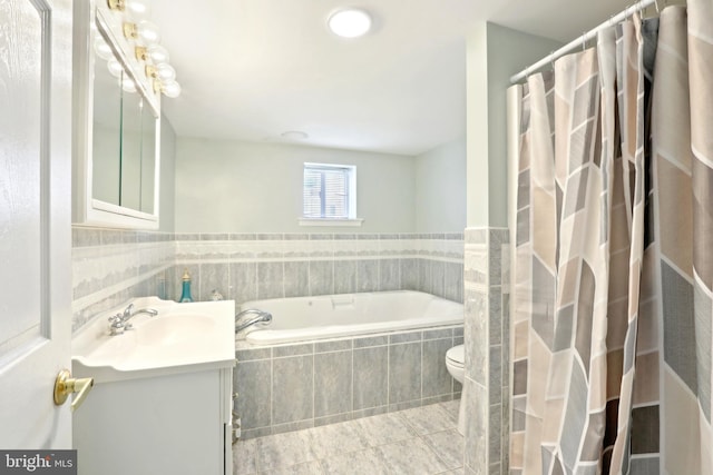 full bath featuring a bath, vanity, and a shower with shower curtain