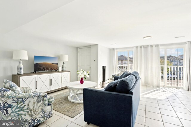 living room with light tile patterned floors