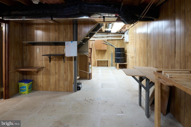 unfinished below grade area with wood walls
