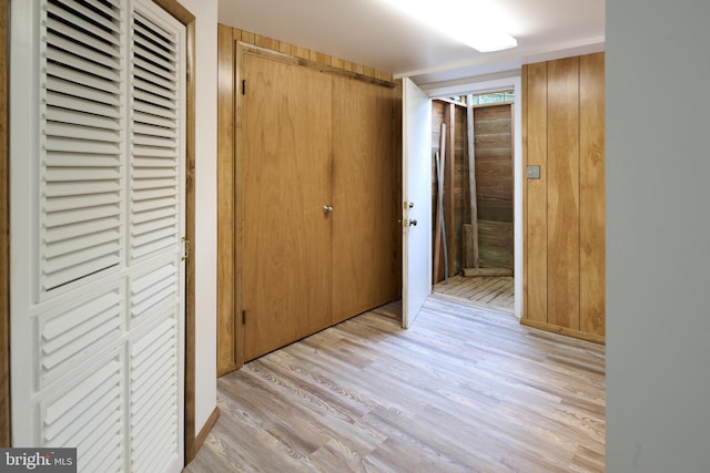 corridor with light wood-style flooring