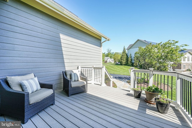 deck featuring a yard