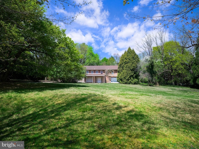 view of yard with an attached garage