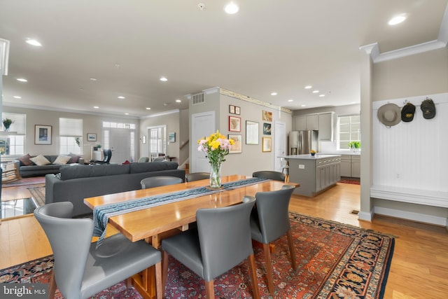 57 Primrose Hill Ln, Annapolis, MD 21403 - dining space with plenty of natural light, visible vents, and ornamental molding