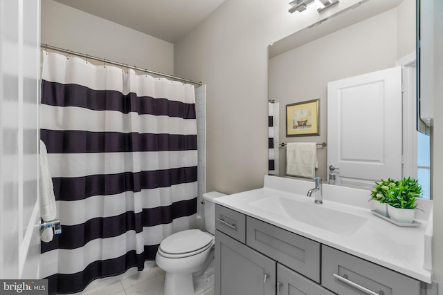 57 Primrose Hill Ln, Annapolis, MD 21403 - bathroom featuring marble finish floor, toilet, vanity, and curtained shower