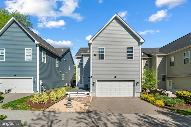 57 Primrose Hill Ln, Annapolis, MD 21403 - traditional-style house with driveway and a garage