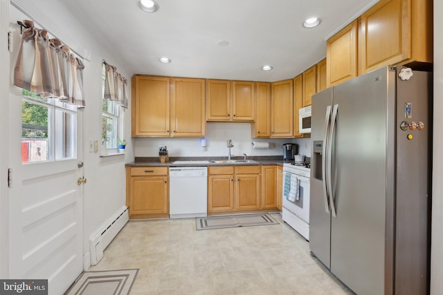 kitchen with dark countertops, a sink, white appliances, recessed lighting, and a baseboard radiator