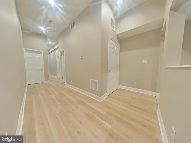 2138 N 18th St, Philadelphia, PA 19121 - corridor with visible vents, light wood-style flooring, and a high ceiling