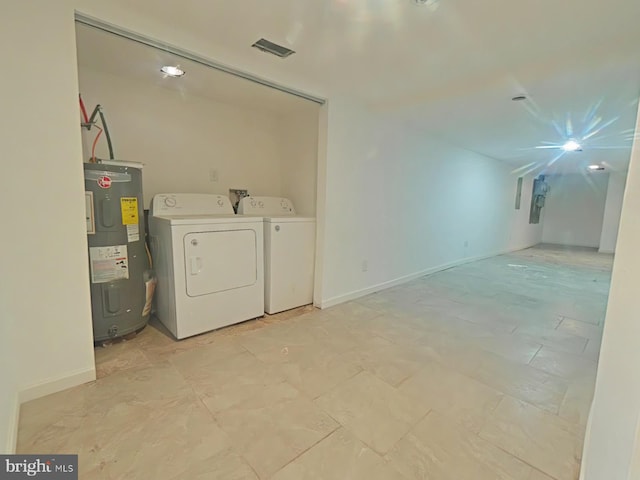 2138 N 18th St, Philadelphia, PA 19121 - washroom featuring water heater, baseboards, washing machine and dryer, and visible vents