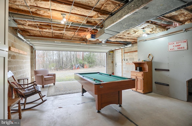 recreation room featuring unfinished concrete floors and pool table