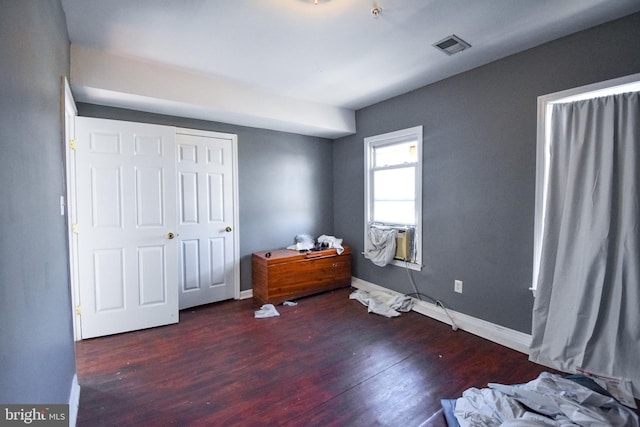 1921 Rhode Island Ave NE, Washington, DC 20018 - bedroom with baseboards, wood finished floors, and visible vents