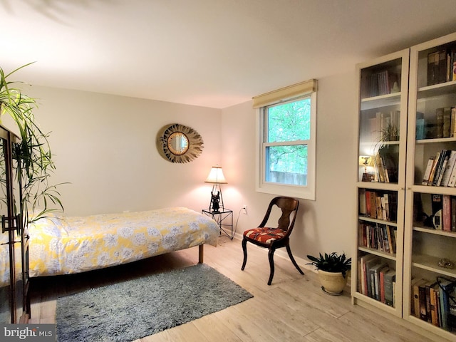 bedroom featuring wood finished floors
