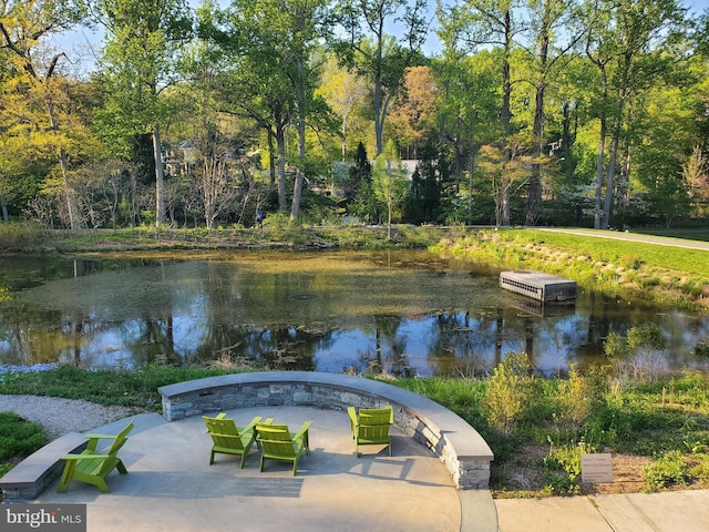 surrounding community featuring a water view