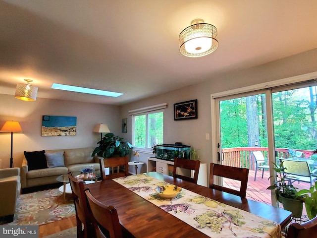 dining room with wood finished floors