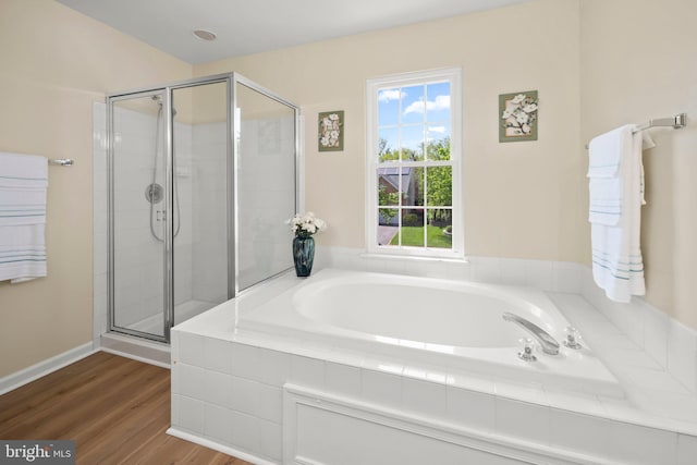 13423 Fairland Park Dr, Silver Spring, MD 20904 - full bath with a healthy amount of sunlight, a shower stall, and a garden tub