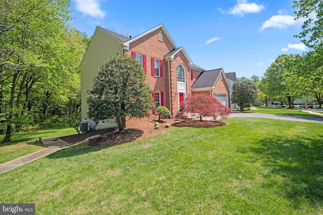 13423 Fairland Park Dr, Silver Spring, MD 20904 - view of front of house with brick siding, a garage, aphalt driveway, and a front yard