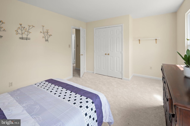 13423 Fairland Park Dr, Silver Spring, MD 20904 - bedroom featuring light colored carpet, baseboards, and a closet