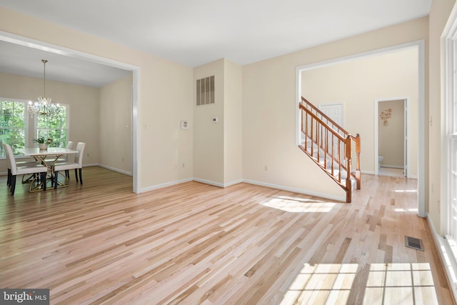 13423 Fairland Park Dr, Silver Spring, MD 20904 - interior space with visible vents, stairway, baseboards, a chandelier, and light wood-style floors