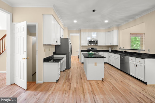 13423 Fairland Park Dr, Silver Spring, MD 20904 - kitchen with a sink, appliances with stainless steel finishes, crown molding, and white cabinets