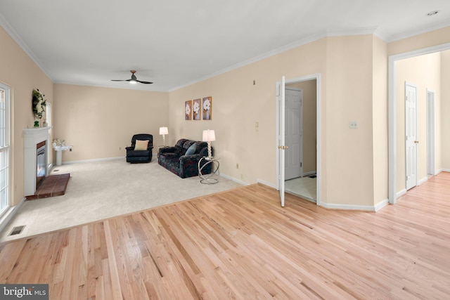 13423 Fairland Park Dr, Silver Spring, MD 20904 - sitting room featuring a ceiling fan, visible vents, wood finished floors, baseboards, and ornamental molding
