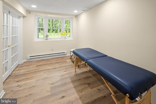 13423 Fairland Park Dr, Silver Spring, MD 20904 - workout room featuring baseboards, a baseboard heating unit, recessed lighting, and wood finished floors