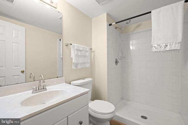 13423 Fairland Park Dr, Silver Spring, MD 20904 - full bath with vanity, a tile shower, toilet, and visible vents