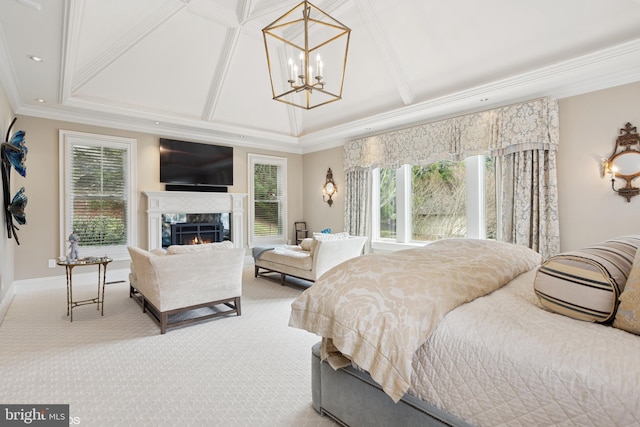 bedroom featuring a premium fireplace, an inviting chandelier, carpet flooring, crown molding, and baseboards