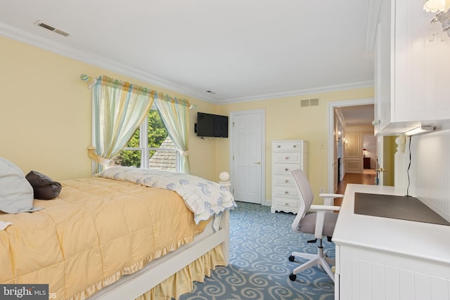 bedroom featuring visible vents, carpet, and crown molding