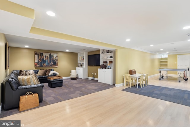 playroom with wood finished floors, recessed lighting, and baseboards