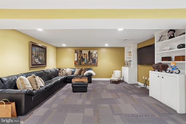 carpeted living area with visible vents, recessed lighting, and baseboards