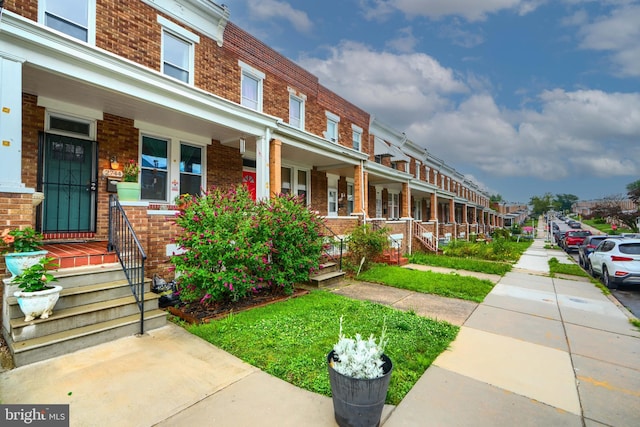 2744 Pelham Ave, Baltimore, MD 21213 - exterior space featuring covered porch and brick siding