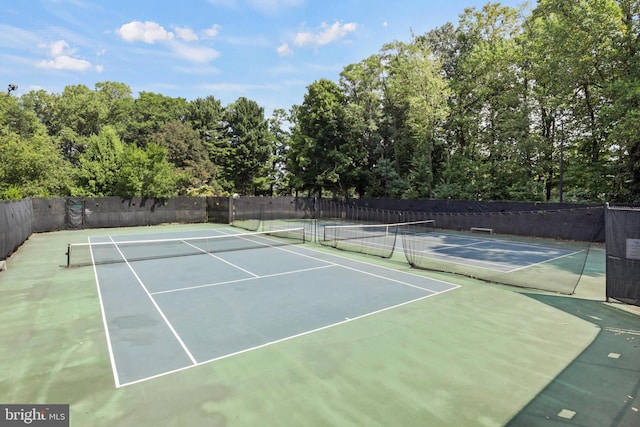 view of sport court with fence and community basketball court