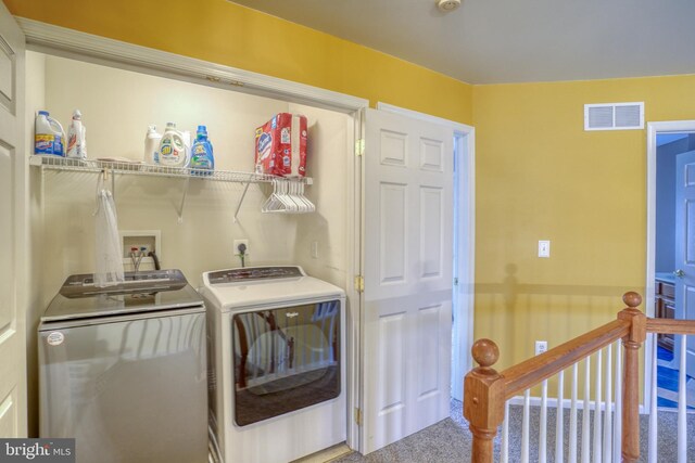 laundry room with visible vents, laundry area, and independent washer and dryer