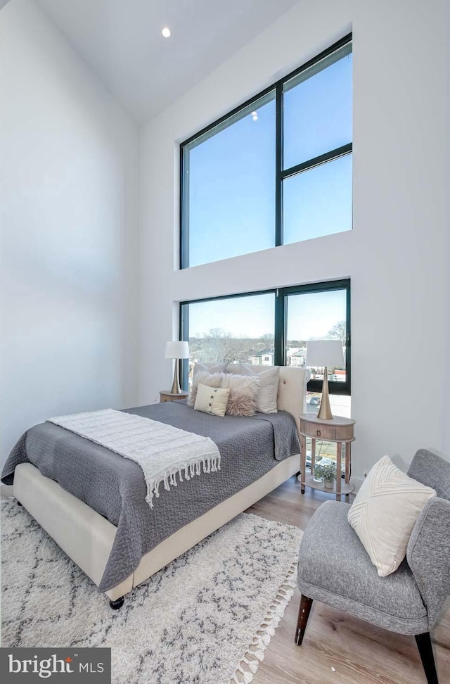4328 Georgia Ave NW Unit 401, Washington, DC 20011 - bedroom with a high ceiling, wood finished floors, and recessed lighting