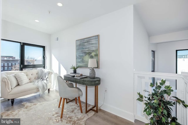 4328 Georgia Ave NW Unit 401, Washington, DC 20011 - interior space featuring vaulted ceiling, visible vents, baseboards, recessed lighting, and wood finished floors
