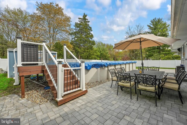 16 Century Way, Hamilton, NJ 08690 - view of patio / terrace with a fenced backyard, outdoor dining area, a fenced in pool, and stairs