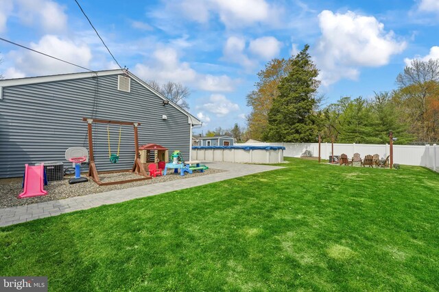 16 Century Way, Hamilton, NJ 08690 - view of yard featuring fence private yard, cooling unit, and a fenced in pool