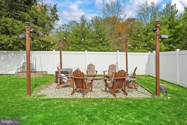 16 Century Way, Hamilton, NJ 08690 - exterior space with an outdoor fire pit, a fenced backyard, and a lawn