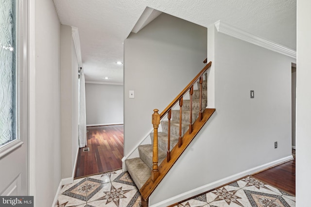 7112 Bonniemill Ln, Springfield, VA 22150 - stairs featuring crown molding, wood finished floors, recessed lighting, and baseboards
