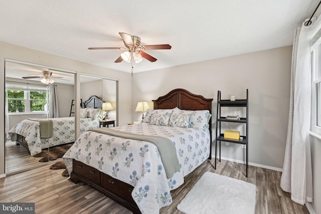 7112 Bonniemill Ln, Springfield, VA 22150 - bedroom featuring wood finished floors, ceiling fan, and baseboards