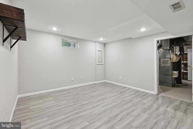 7112 Bonniemill Ln, Springfield, VA 22150 - below grade area with wood finished floors, baseboards, and recessed lighting