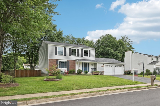 7112 Bonniemill Ln, Springfield, VA 22150 - view of front facade featuring an attached garage, asphalt driveway, and brick siding