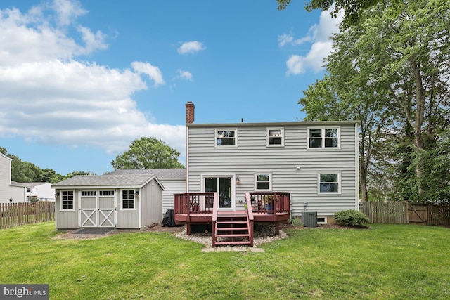 7112 Bonniemill Ln, Springfield, VA 22150 - back of property featuring a deck, a chimney, and central AC