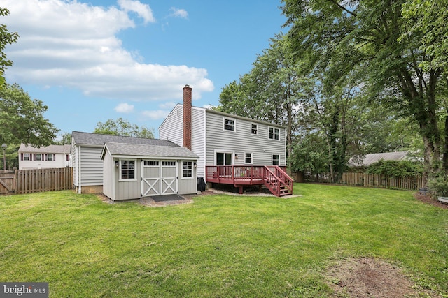 7112 Bonniemill Ln, Springfield, VA 22150 - rear view of house with a deck and a chimney