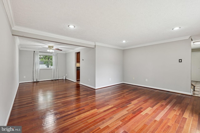 7112 Bonniemill Ln, Springfield, VA 22150 - spare room featuring wood finished floors, a ceiling fan, baseboards, crown molding, and a textured ceiling