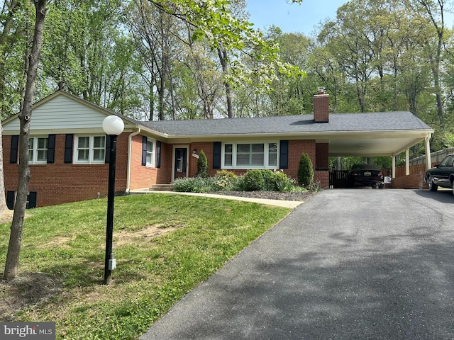 13709 Wendover Rd, Silver Spring, MD 20904 - single story home featuring brick siding, asphalt driveway, a front lawn, and a chimney