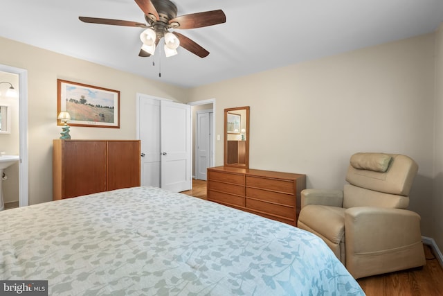 13709 Wendover Rd, Silver Spring, MD 20904 - bedroom with wood finished floors, baseboards, and ceiling fan