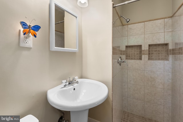 13709 Wendover Rd, Silver Spring, MD 20904 - bathroom with tiled shower, toilet, and a sink