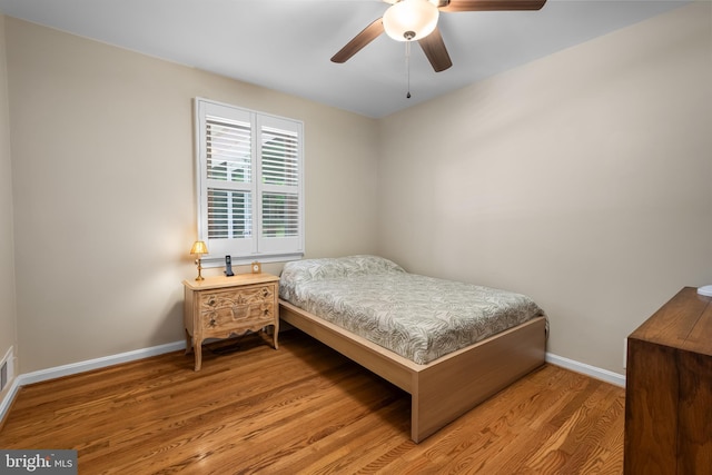 13709 Wendover Rd, Silver Spring, MD 20904 - bedroom with wood finished floors, baseboards, and a ceiling fan