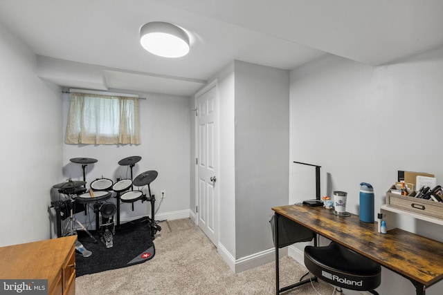 home office featuring carpet floors and baseboards