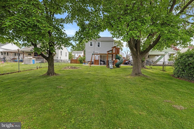 view of yard with a playground
